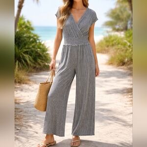 Caution to the Wind Black White Striped Jumpsuit M Smocked Waist V-Neck Wide Leg